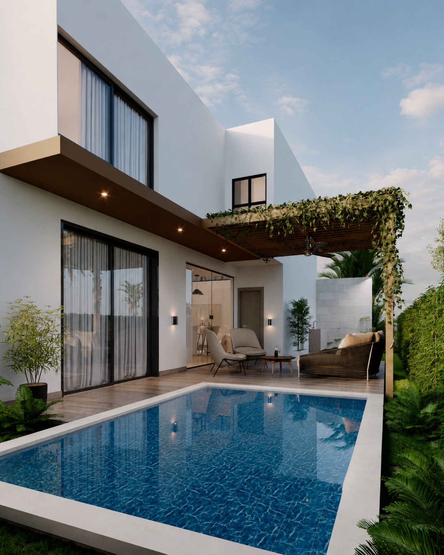 Vista desde el jardín con piscina